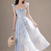 Backless Floral Maxi Dress With A Bow Tie Neckline