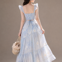 Backless Floral Maxi Dress With A Bow Tie Neckline
